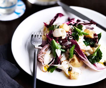 Salad of grilled baby calamari, radicchio and potatoes