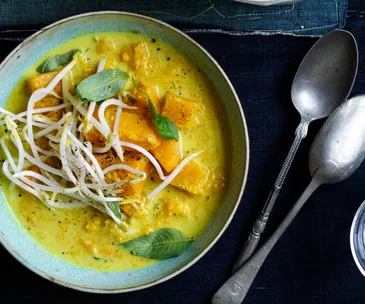 Spiced pumpkin soup with bean sprouts