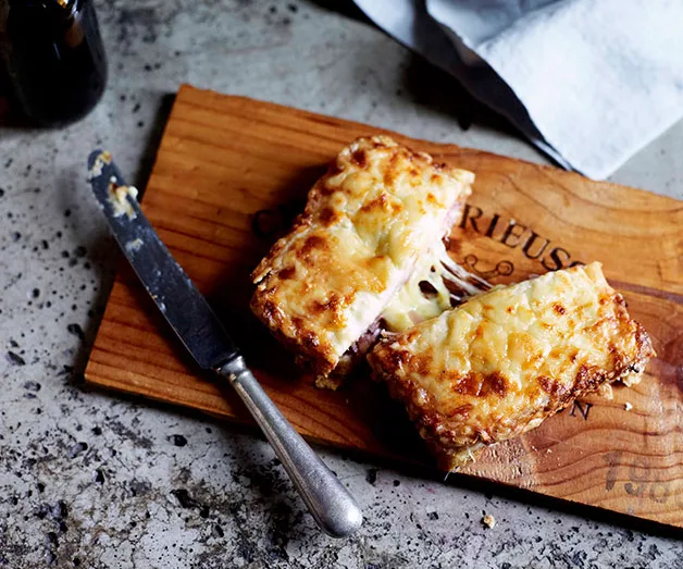 Croque-monsieur with smoked ham, cheese and smoked sausage