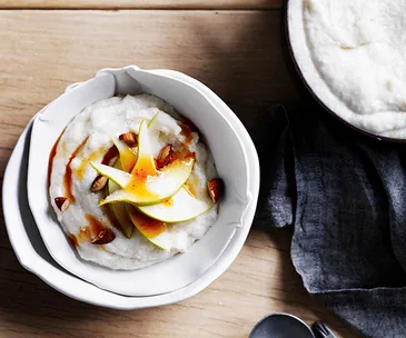 White breakfast polenta with pears, burnt honey and almonds