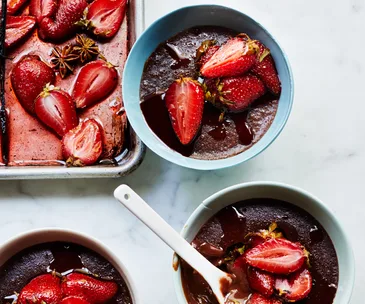Baked chocolate creams with roasted strawberries