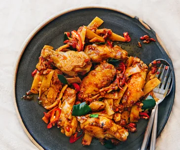 Amy Chanta and Palisa Anderson’s padt pedt gai (stir-fried spicy chicken wings and bamboo shoots)