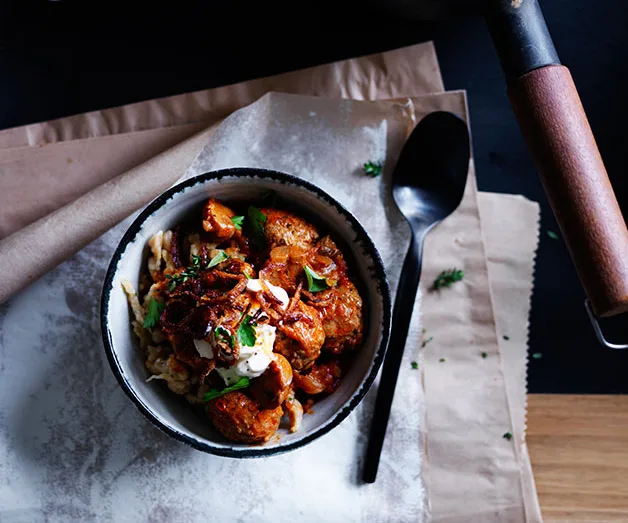 Paprika beef meatballs with sour cream and crisp onion