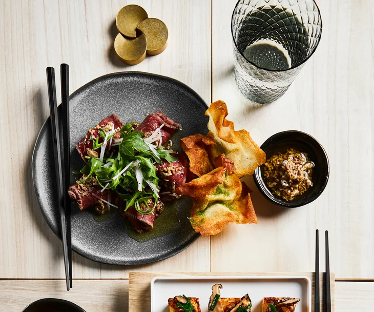Kazuki&rsquo;s beef tataki with anchovy dressing and potato chips