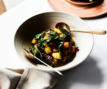 Helly Raichura’s stir-fried warrigal greens and vegetables (shak bhaja)