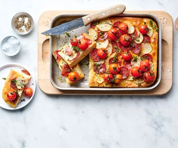 Blistered tomato, potato and truffle salami breakfast bread