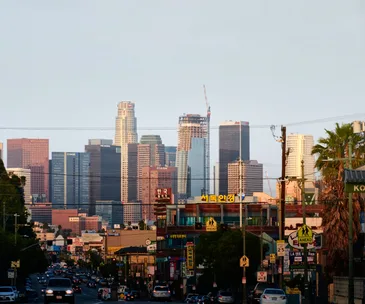 Photo of skyscrapers, power lines and cars in traffic in Los Angeles's Koeratown