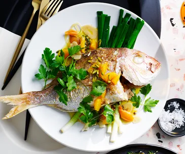Whole snapper with orange and pistachio sauce