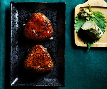 Onigiri (Japanese rice balls) with nori and brushed with miso glaze