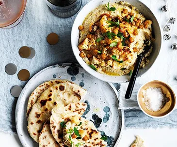 Roast cauliflower hummus with fried chickpeas and flatbread