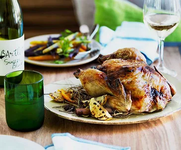 Chicken roasted in spiced hay with lemon stuffing