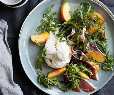 Peaches with burrata, prosciutto crudo and rocket