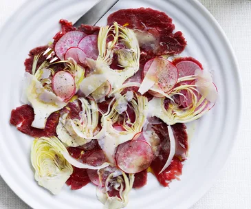 Beef carpaccio with artichoke and radish