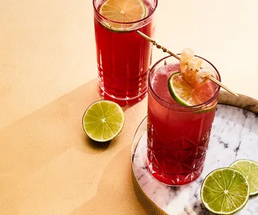 Two glasses of a Blackberry Buck cocktail.