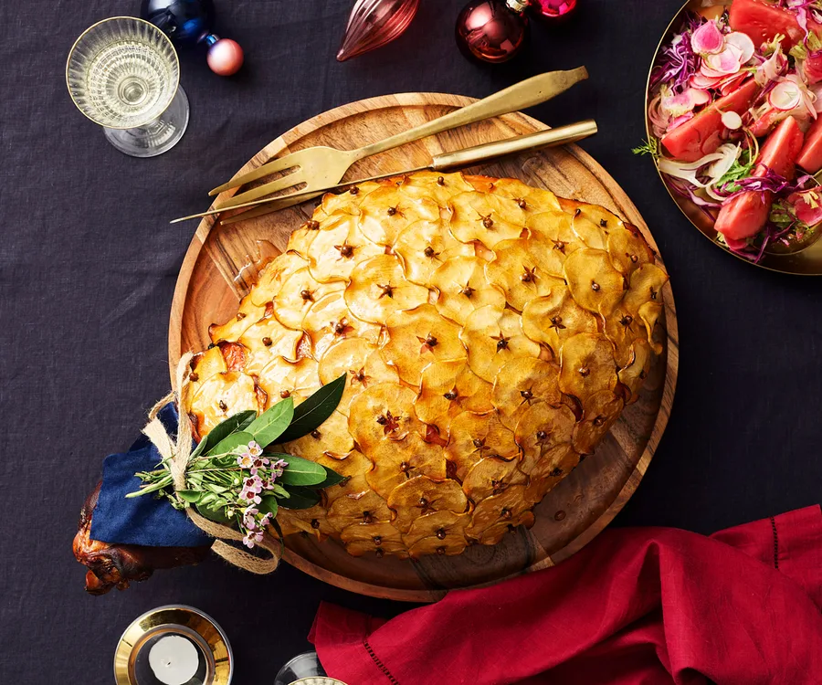 Amaretto and cherry-glazed ham with pistachio and herb crust