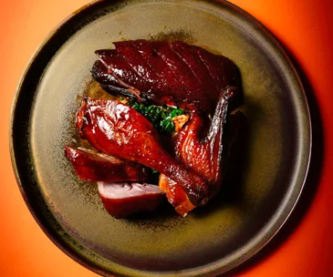 Aerial view of dry aged duck at King Clarence in Sydney