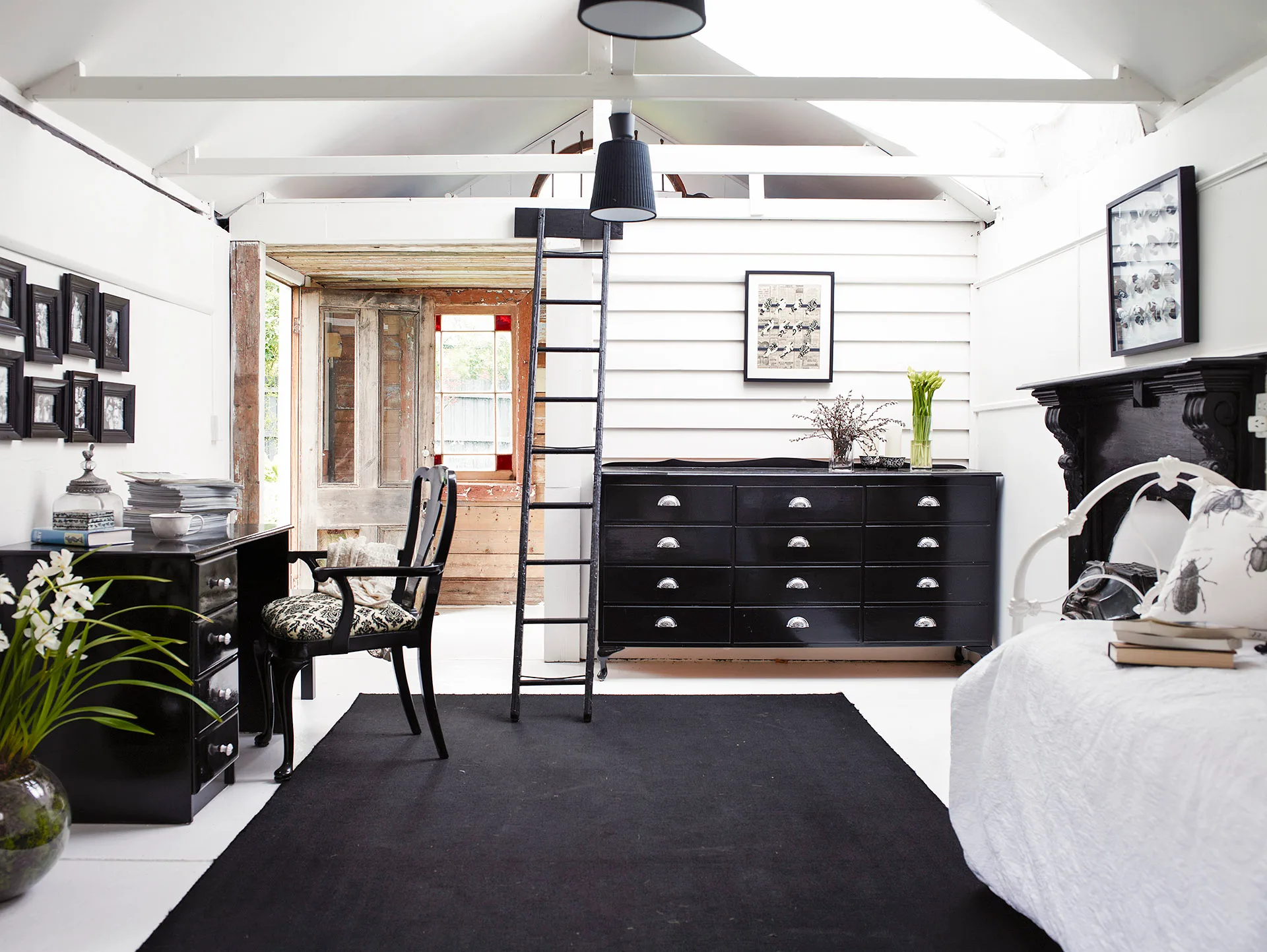 Back and white home office in a studio.
