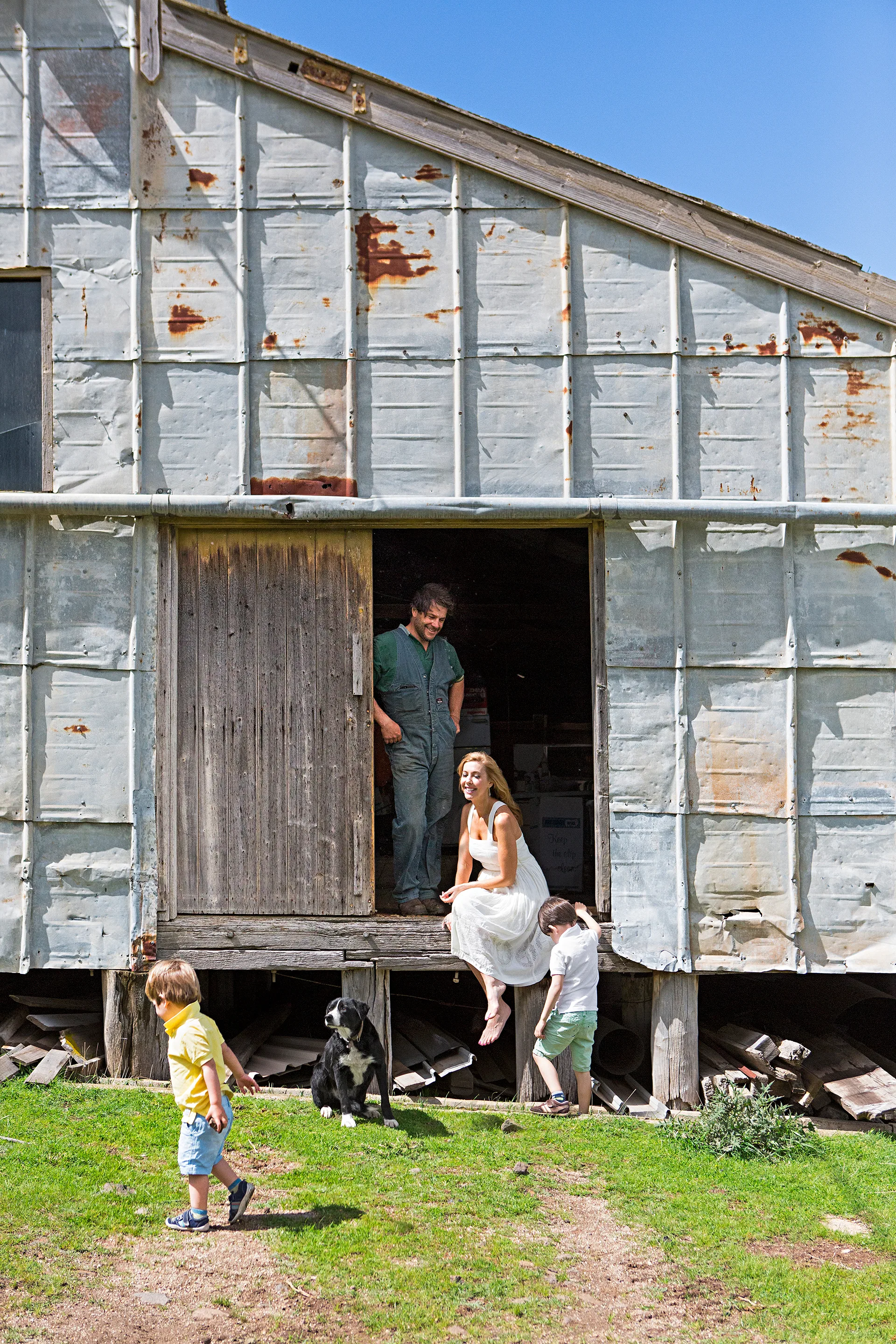 Catriona Rowntree and family at the shearing shed at her property in rural Victoria.