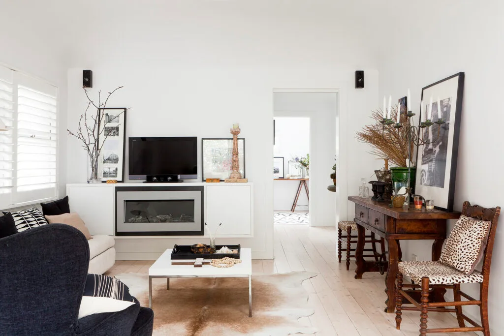 White coastal living room in a coastal weekender.