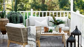 Coastal style small balcony with outdoor lounge setting.