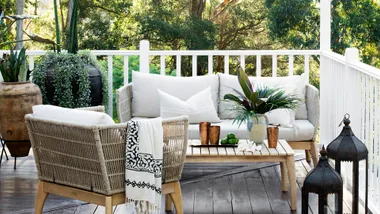 Coastal style small balcony with outdoor lounge setting.