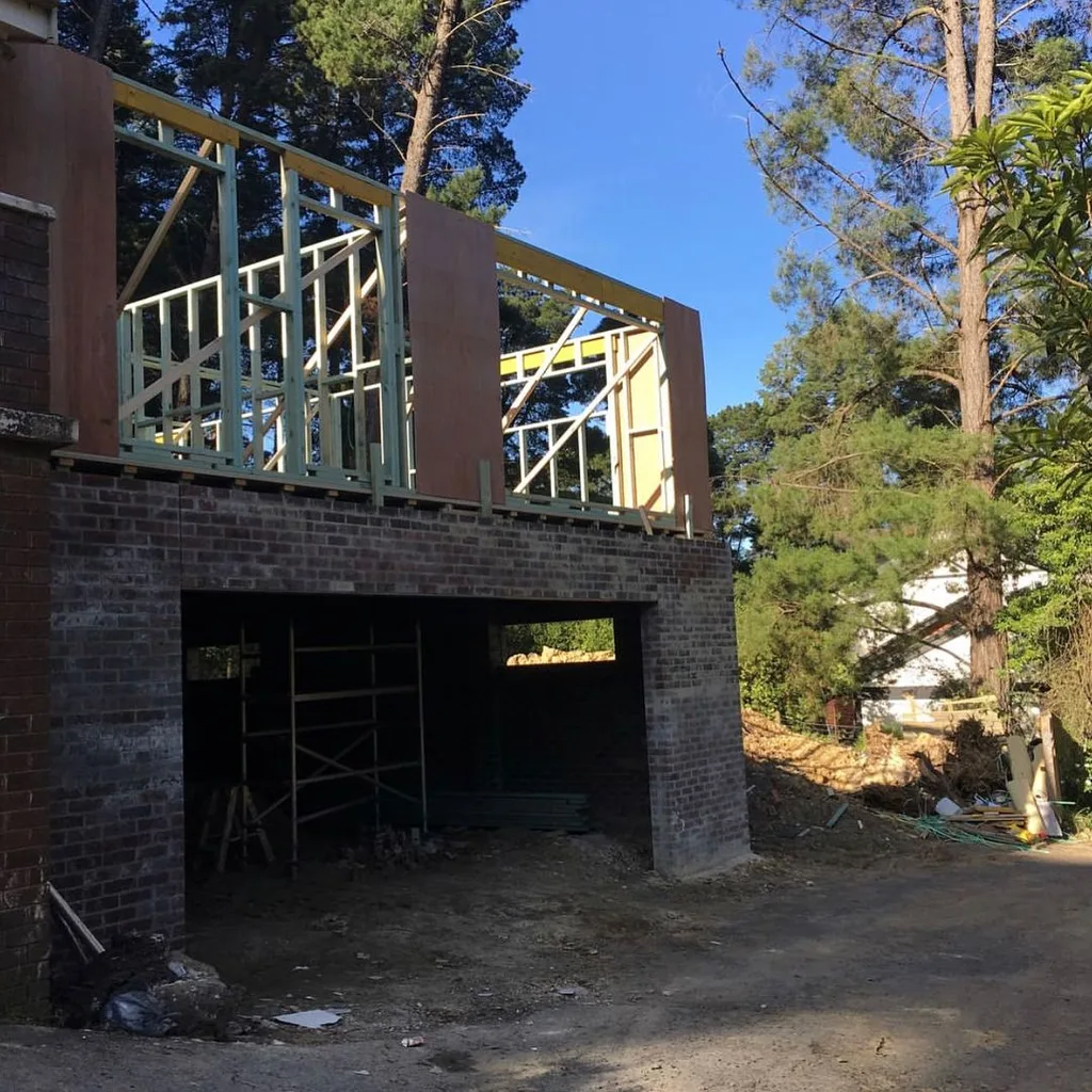 The unfinished exterior of Adam Docile's home renovation.
