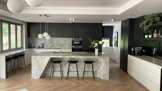 Adam Docile and wife Lisa's finished kitchen with a black and white palette.