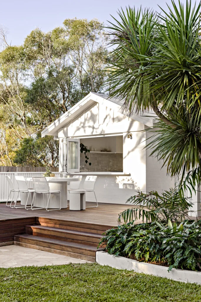 Beach house rear deck with alfresco dining area.