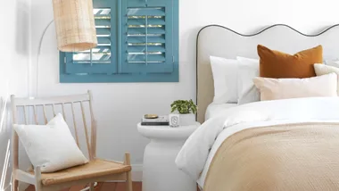 Here’s how to style a bed like a pro