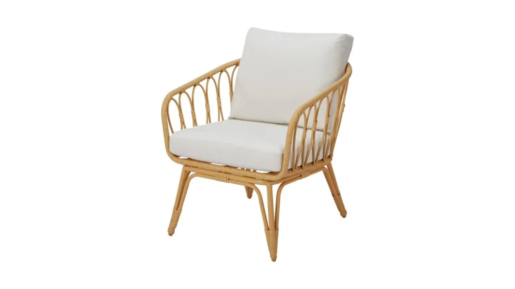 Rattan chair with beige cushions