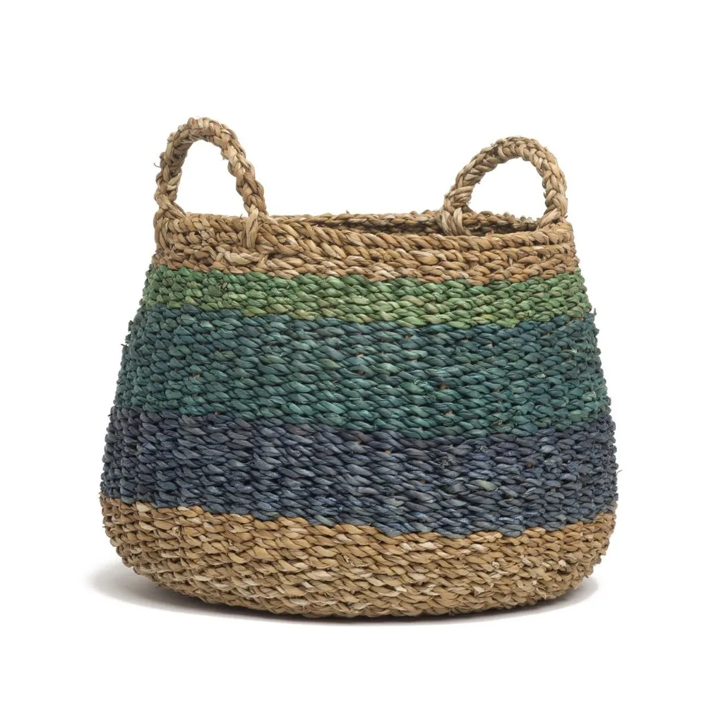 A rattan basket with green stripes