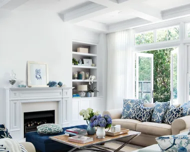 Hamptons style living room with coffered ceiling.