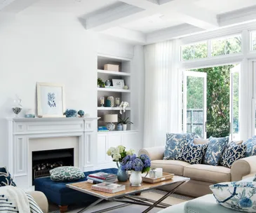 Hamptons style living room with coffered ceiling.