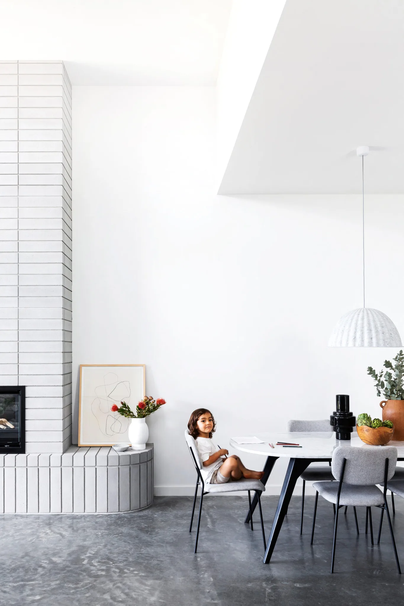 Image showcasing A Modern Penthouse Dares to Bare Exposed Concrete Walls