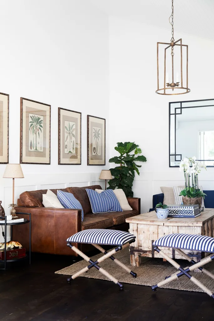 A leather lounge in a Hamptons style living room.