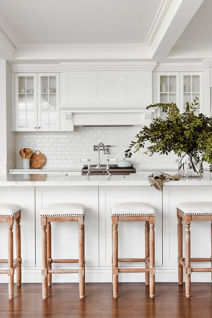 White kitchen with silver pot filler