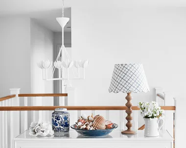 A cordless table lamp is part of the decor.