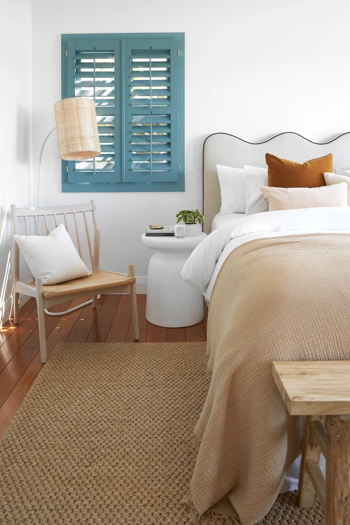 A guest room with a reading nook.