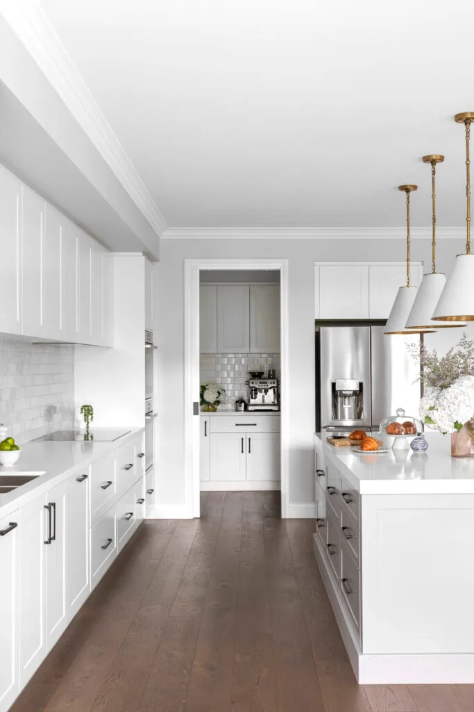 White Hamptons kitchen with butlers pantry