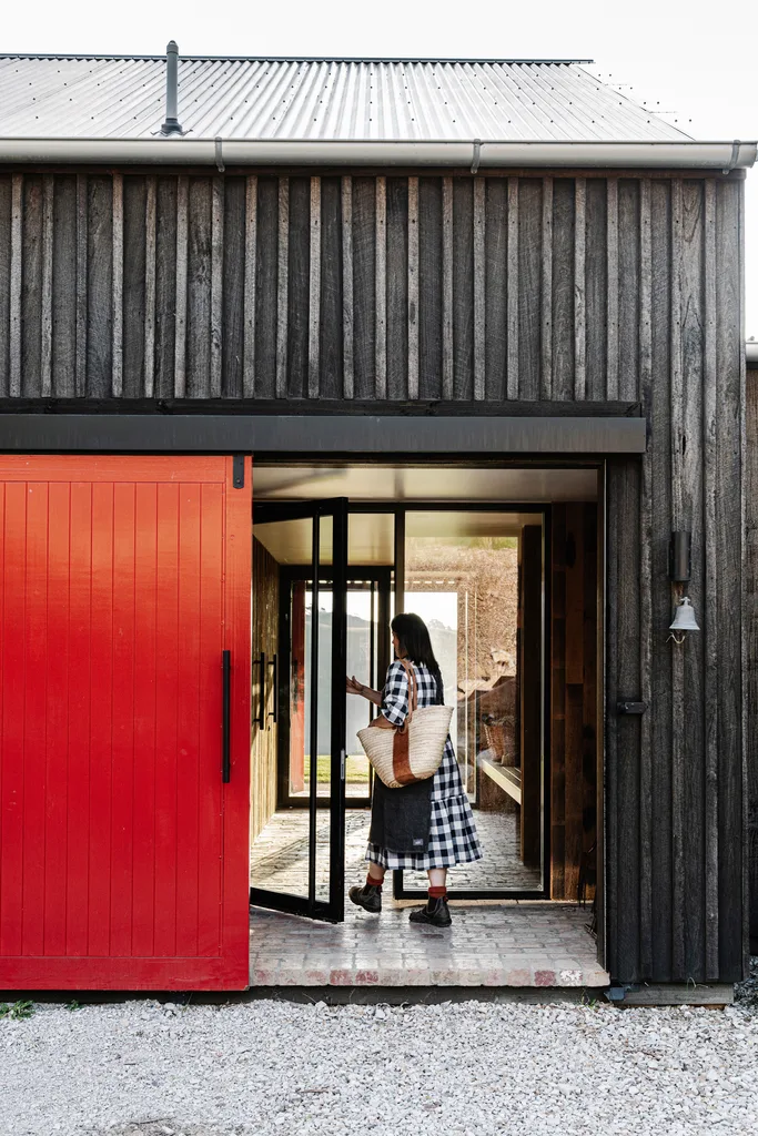modern barn house entrance red front door