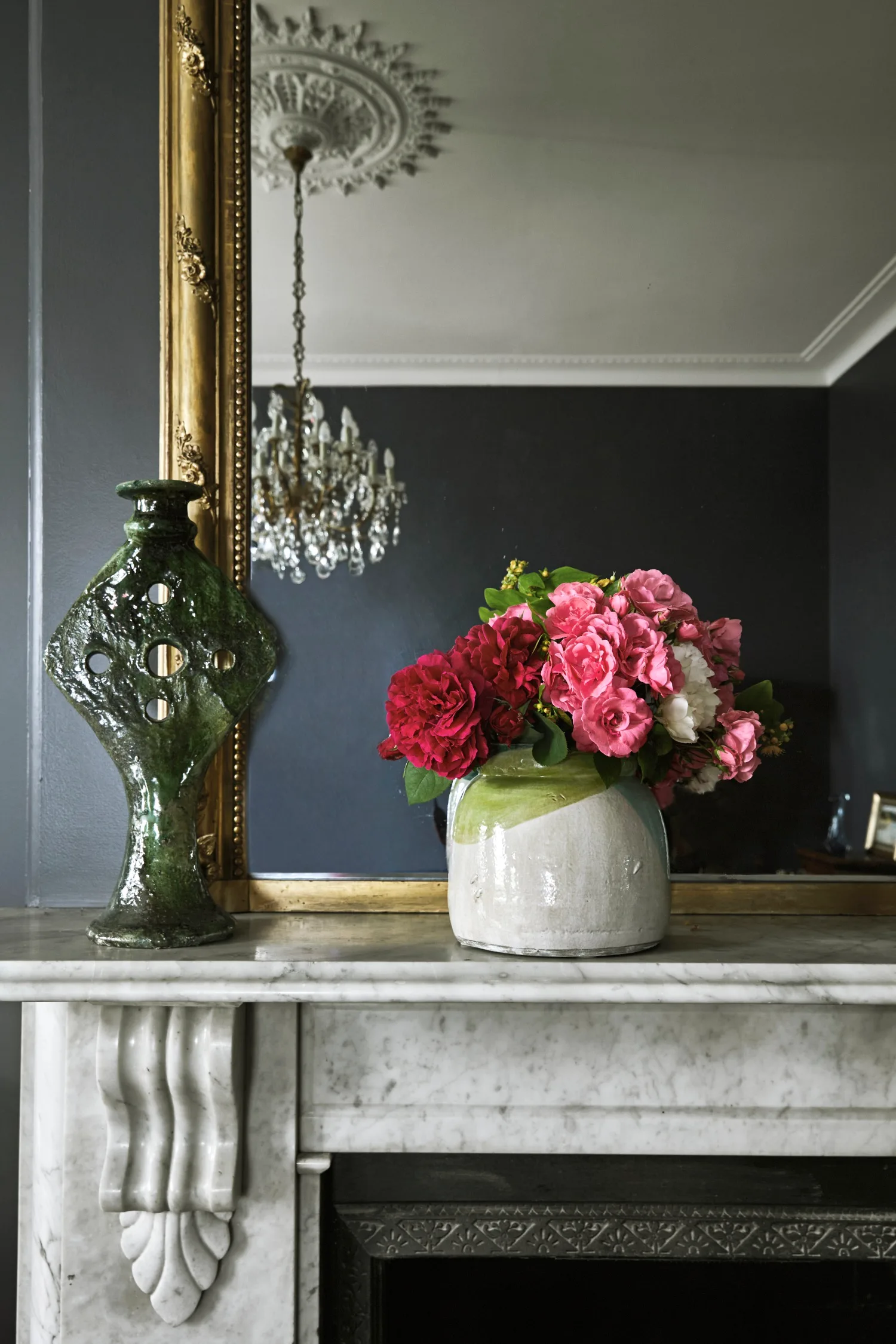 Marble fireplace with black wall