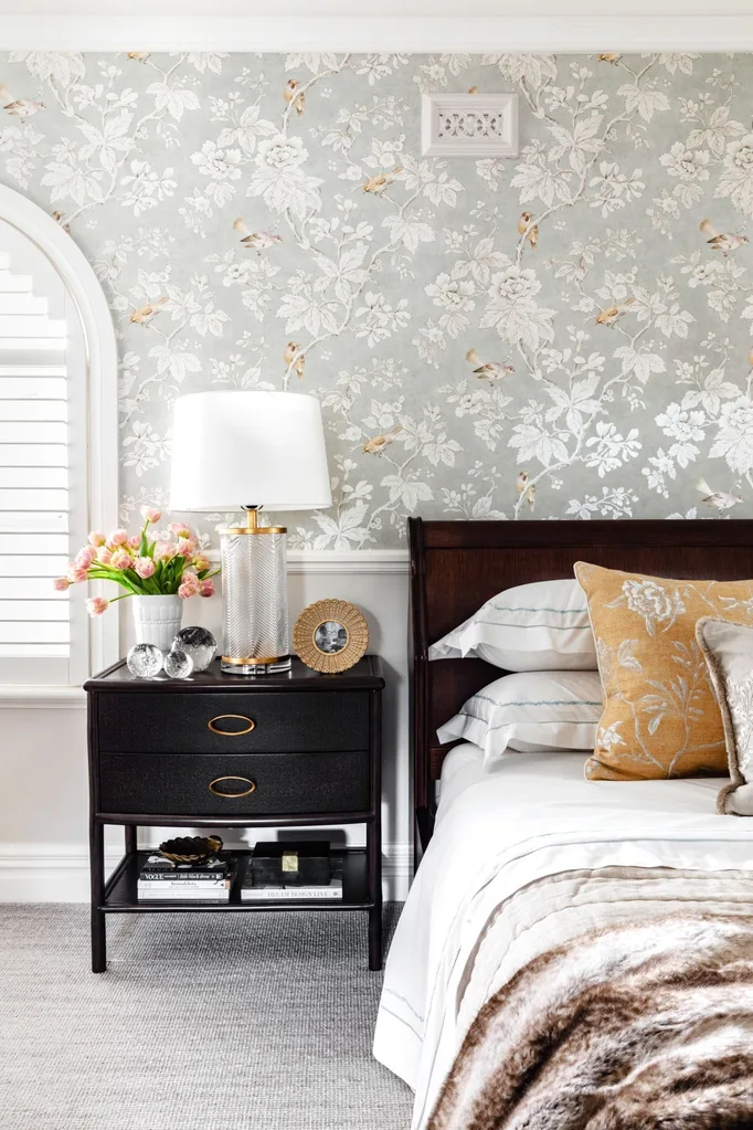 bedroom with leafy wallpaper