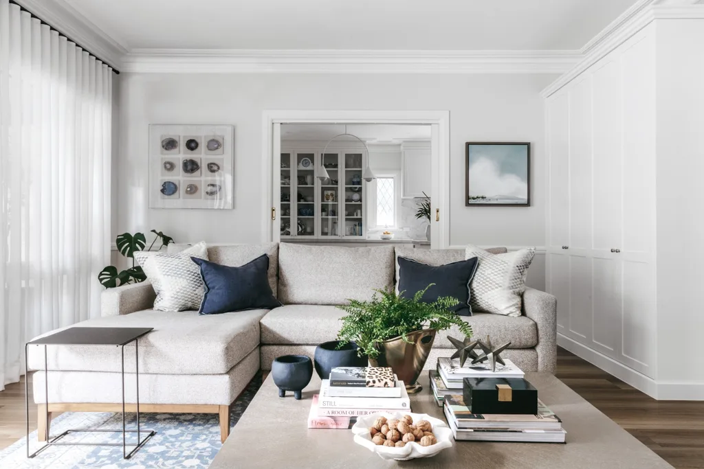 white living room with cream sofa