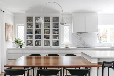 white kitchen with grey pendants