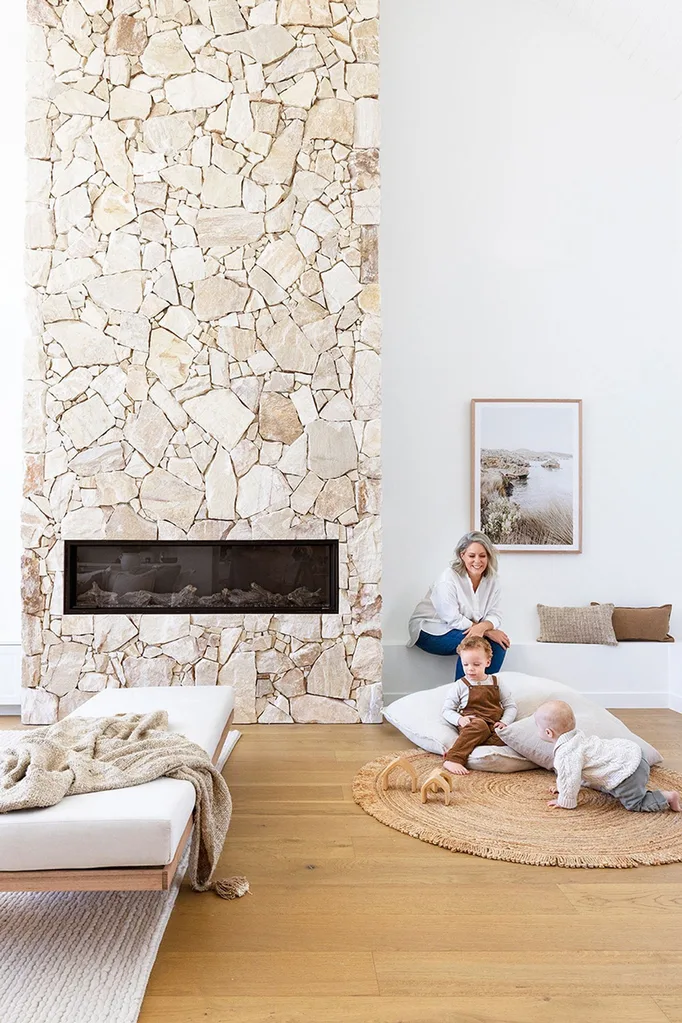 Coastal style stone fireplace