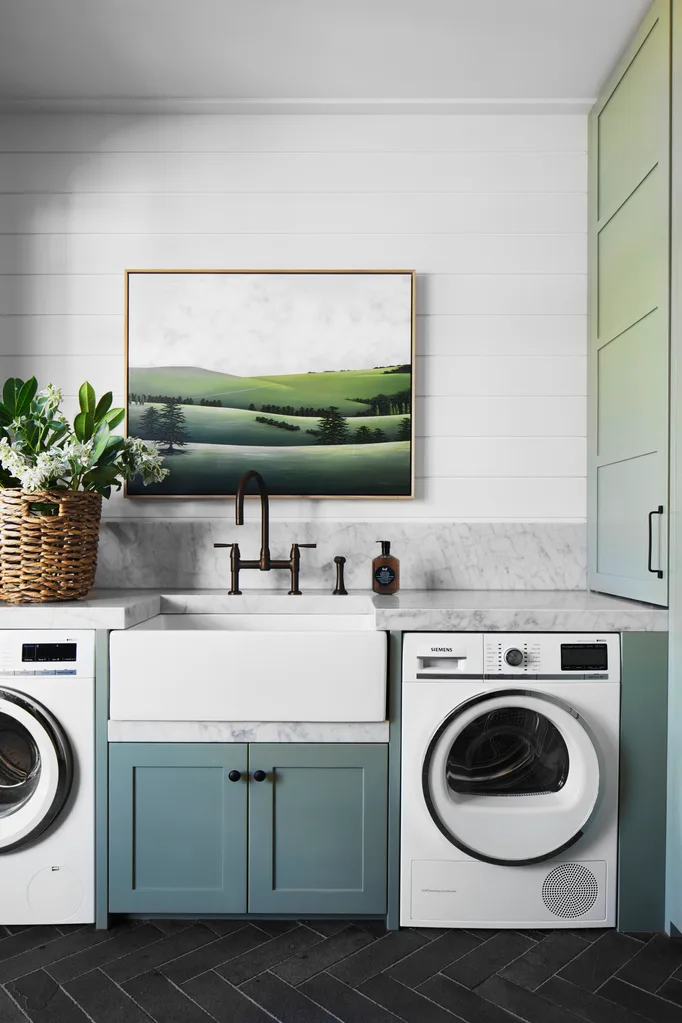 green laundry with farmhouse sink