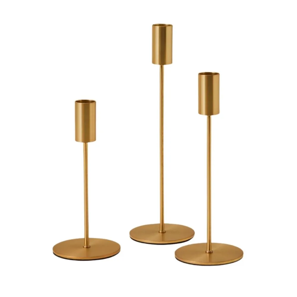 Set of three gold candelsticks