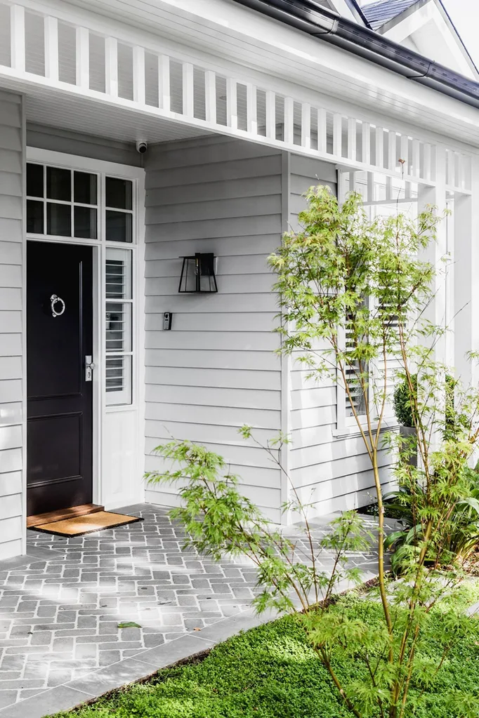 White, grey and black Hamptons home exterior