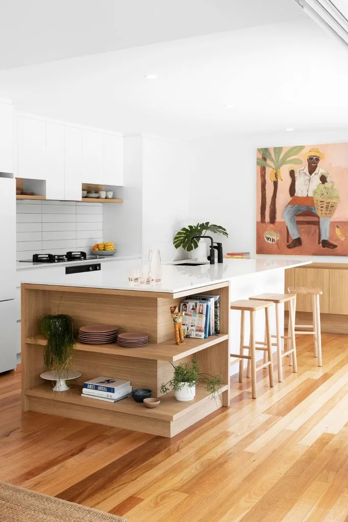 White and timber Scandi-style kitchen island bench with open-shelf storage