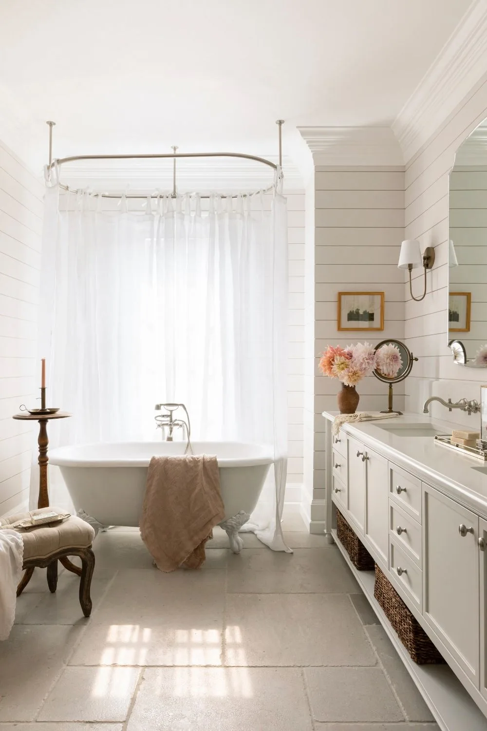 Country or Hamptons style large bathroom with clawfoot Victorian bath